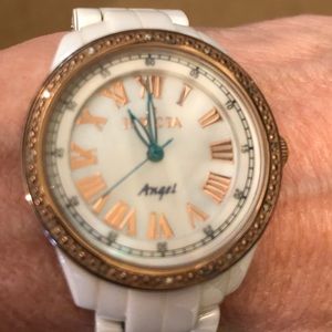 Women’s ceramic Invicta watch.